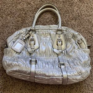 Prada authentic silver leather purse with shoulder strap